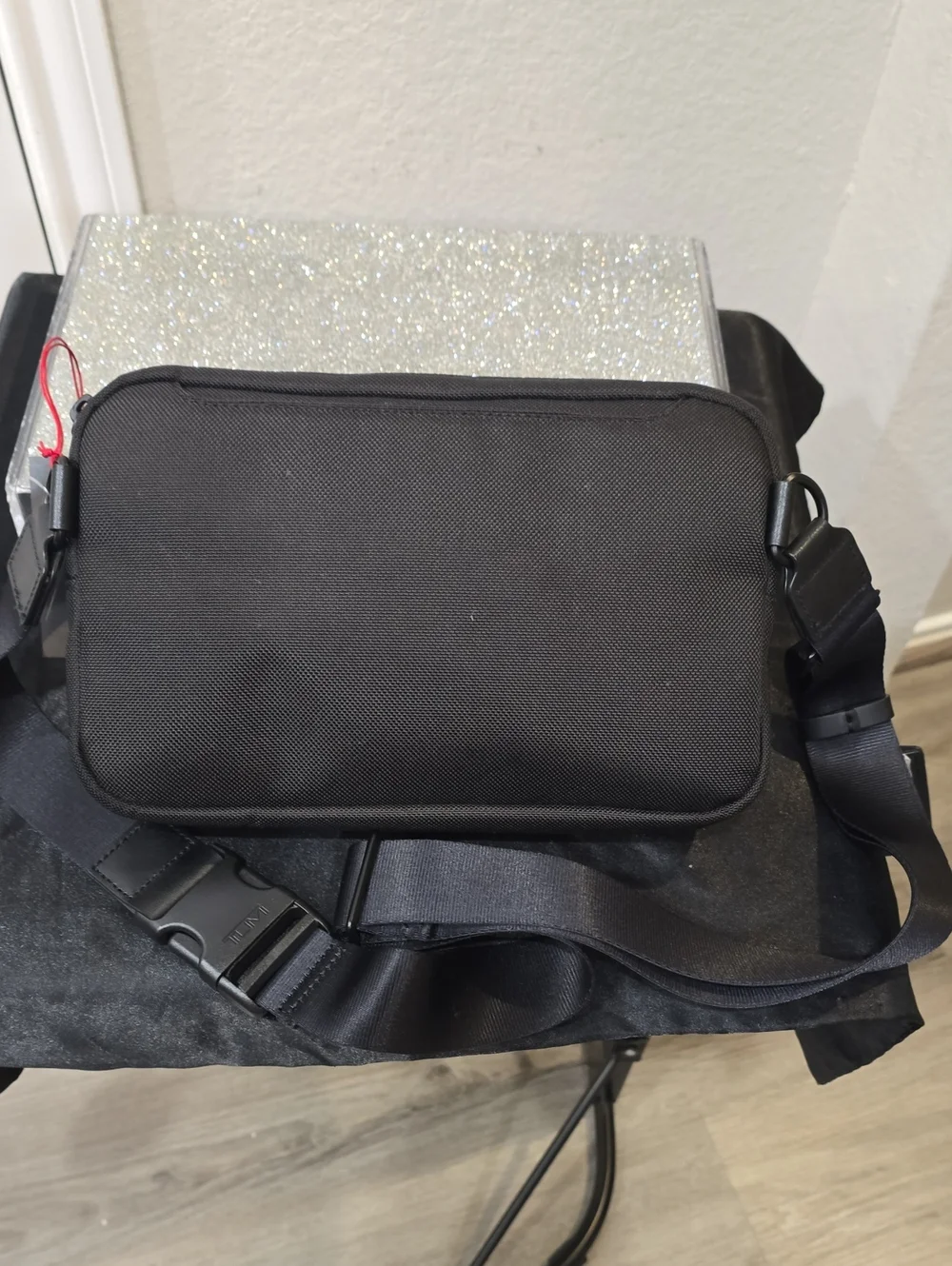 Tumi East West Sling Bag- Black